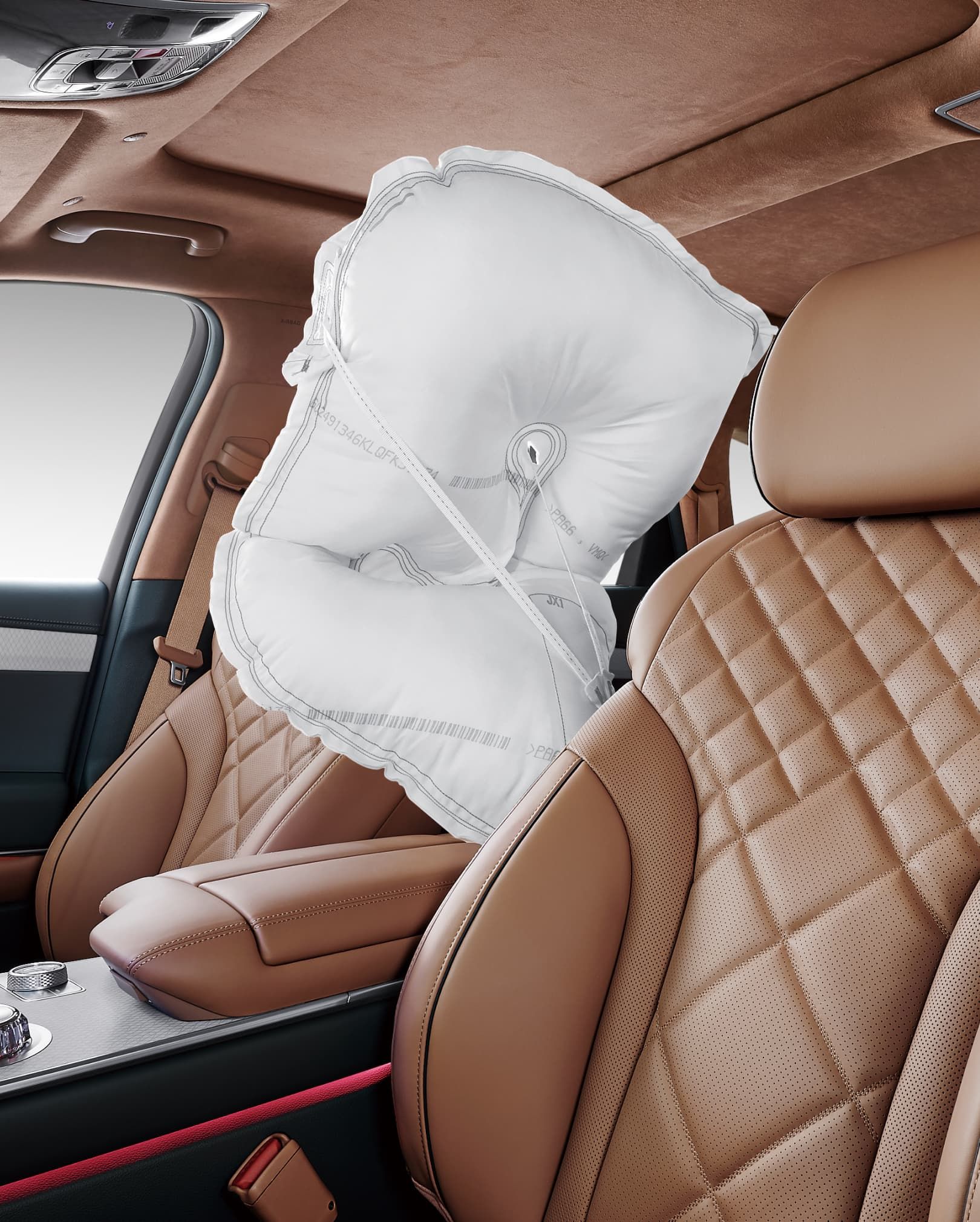 An airbag is seen between the driver's seat and the passenger seat.