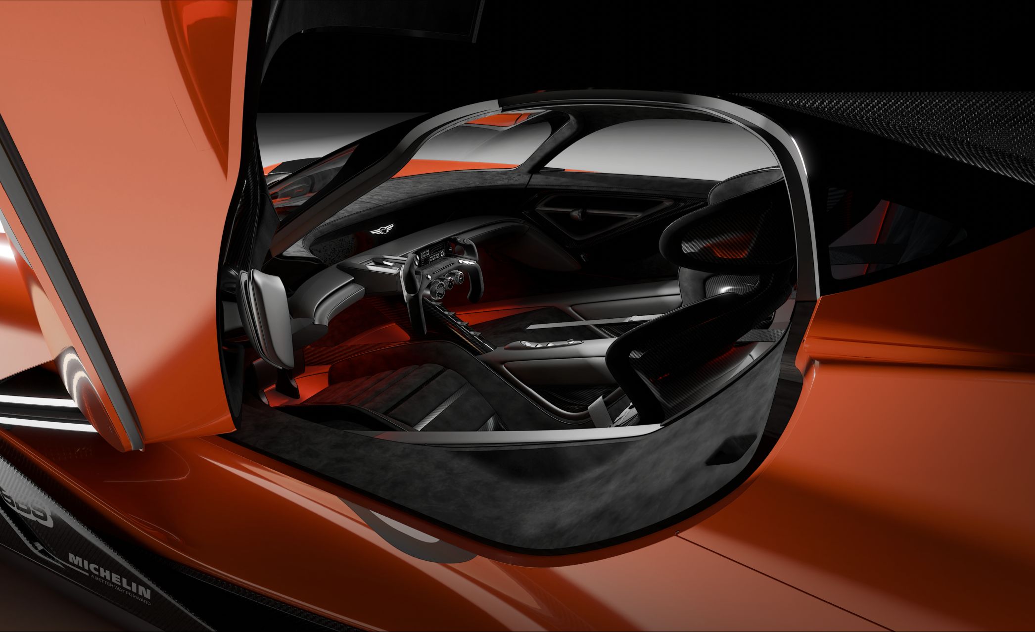 Reflected in a side mirror-like surface, the front seats of the X Gran Racer Concept reveal an interior elegantly crafted in black and silver.