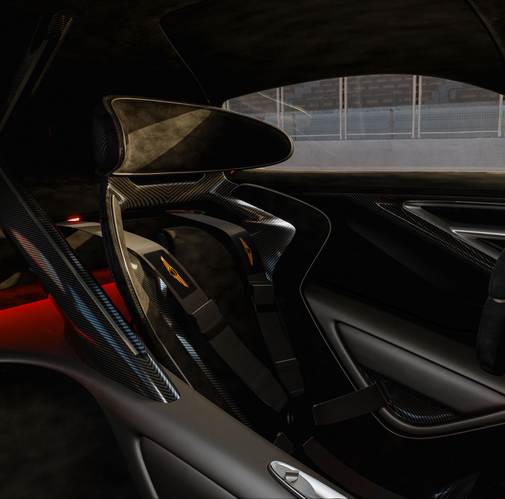 An angled view of the X Gran Racer Concept’s interior reveals both the driver and passenger seats, reclined further back than in typical cars. The interior is elegantly crafted in black and silver tones.