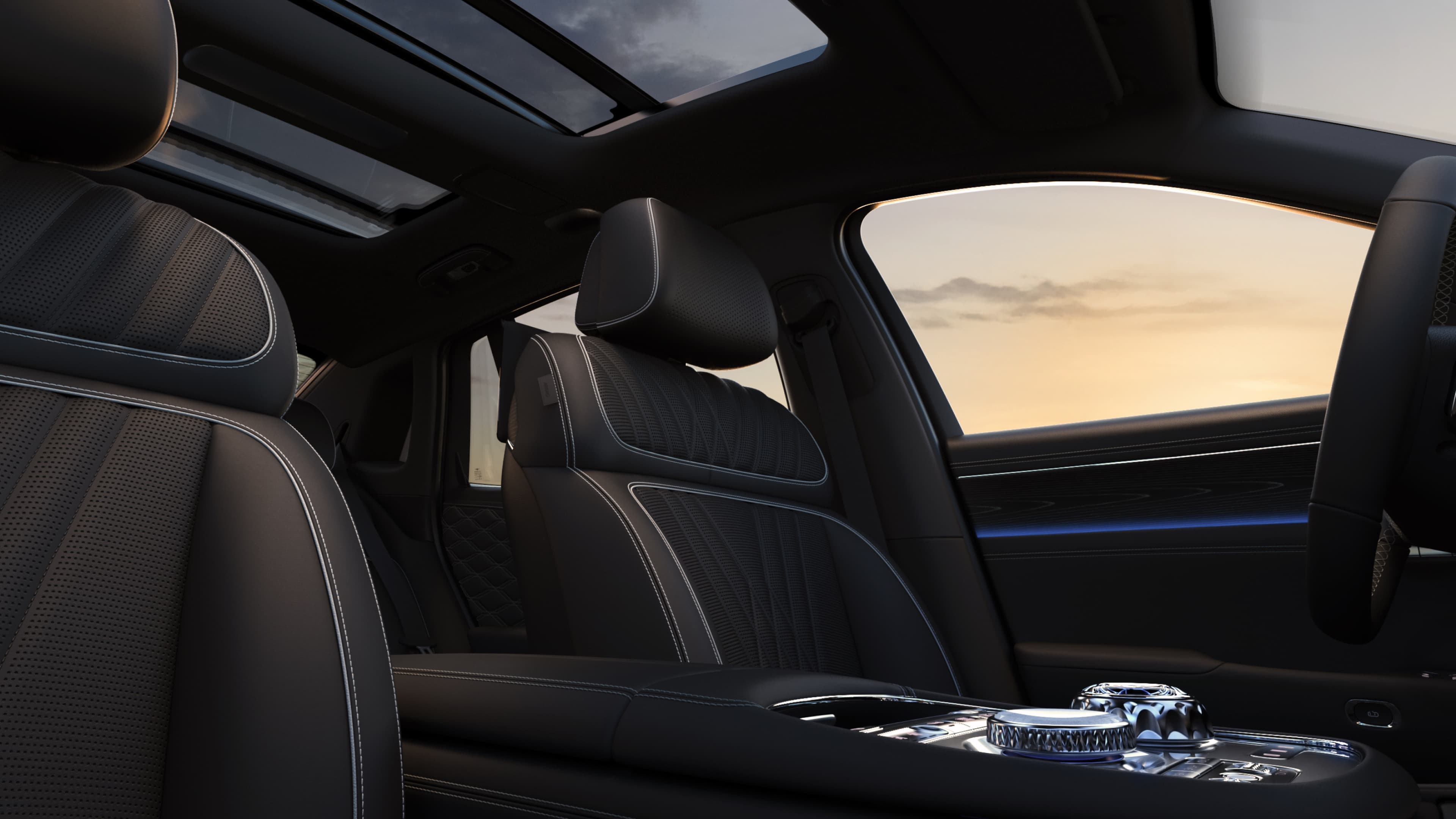 Blue mood lighting shines on the passenger side of G90 with Obsidian Black and Modern Gray Two-tone interior.