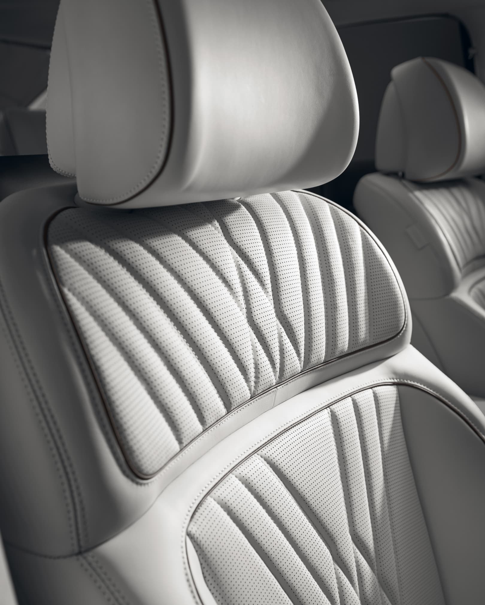 Quilted seat inside Glacier White interior.