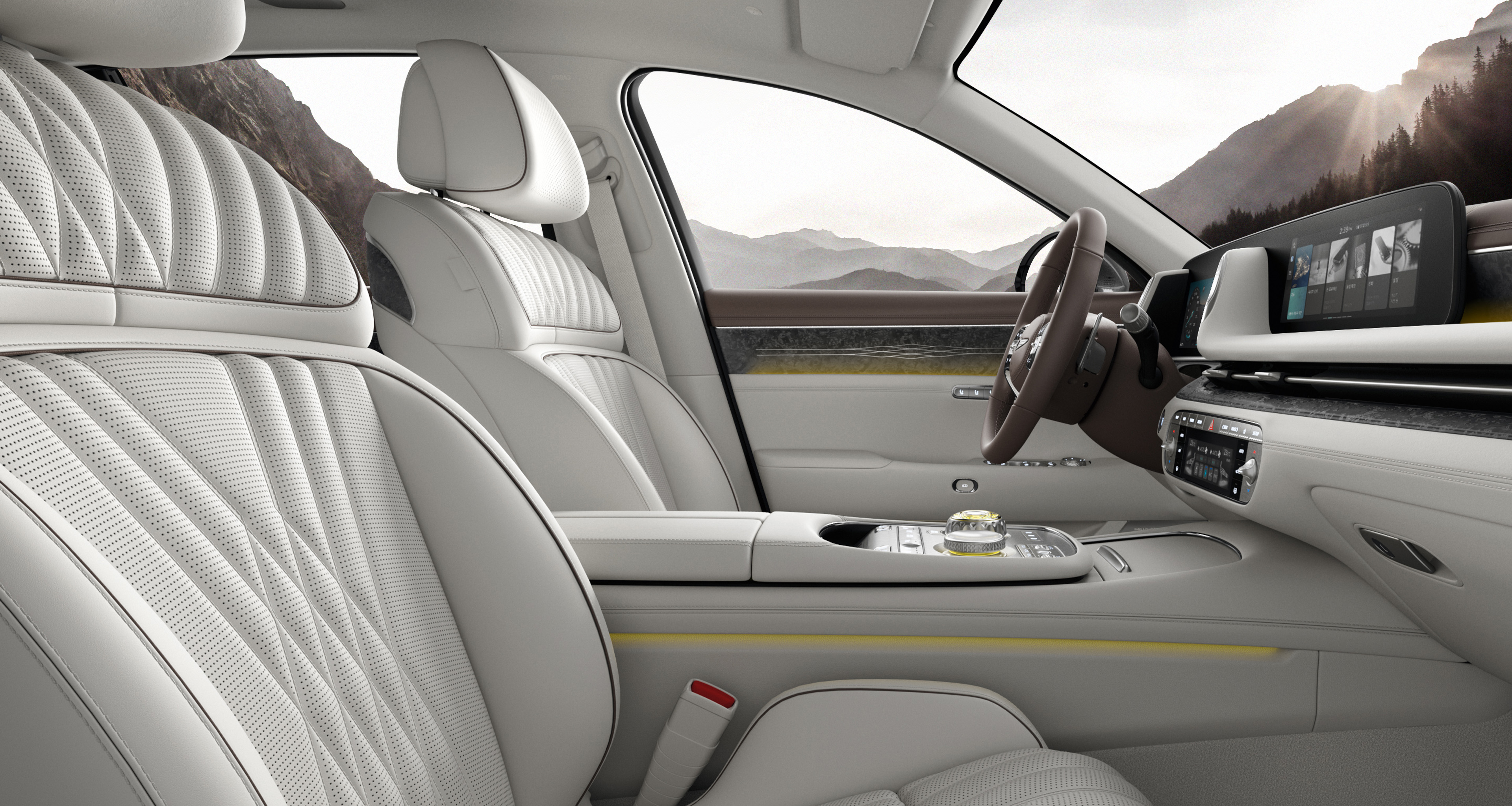Yellow mood lighting shines on the driver-side door inside G90 with Urban Brown and Glacier White Two-tone interior.
