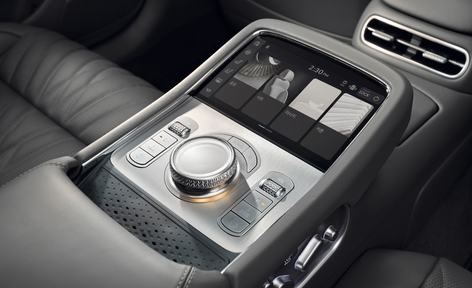 Armrest Touch Screen seen beside Glacier White seats.