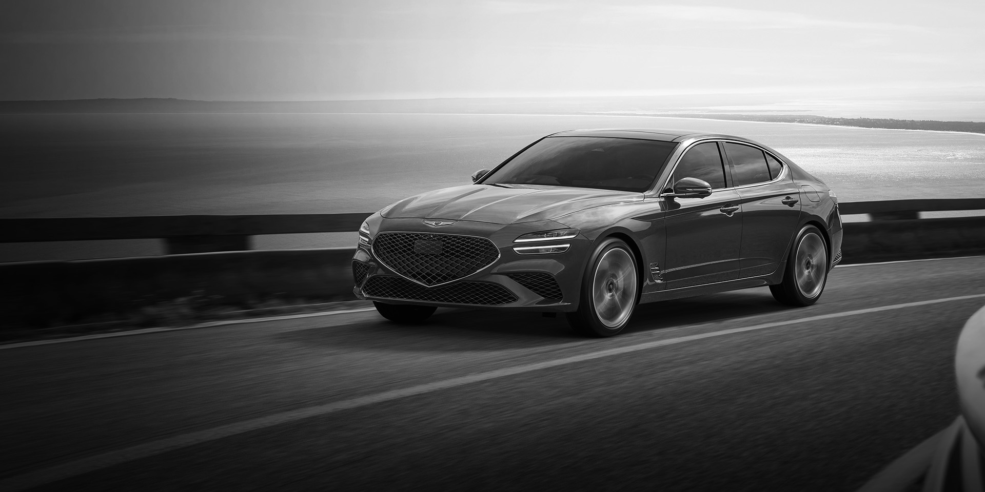 GENESIS G70 vehicle is driving on the road