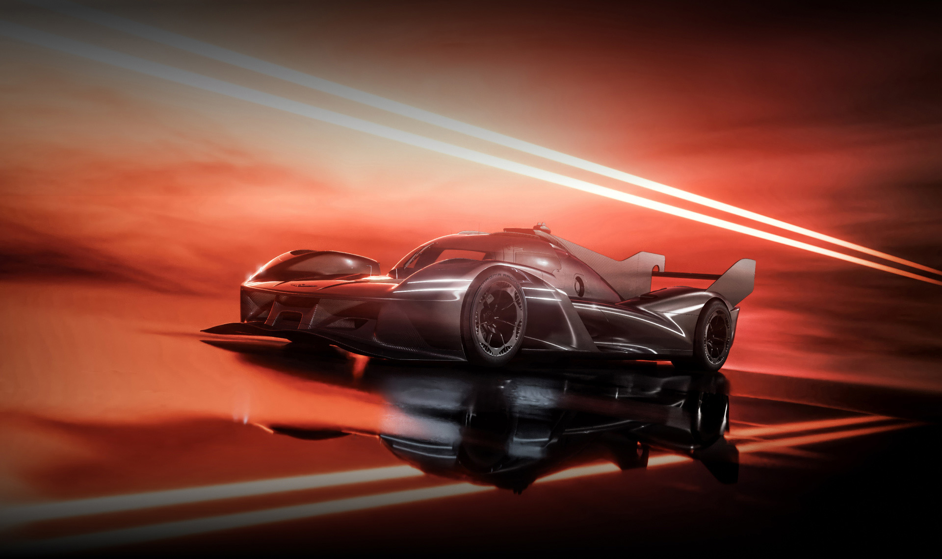 The GMR-001 Hypercar stands on a dark road, facing forward. 