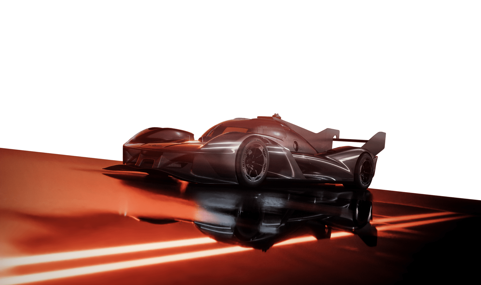  The GMR-001 Hypercar stands on a dark road, facing forward. 
