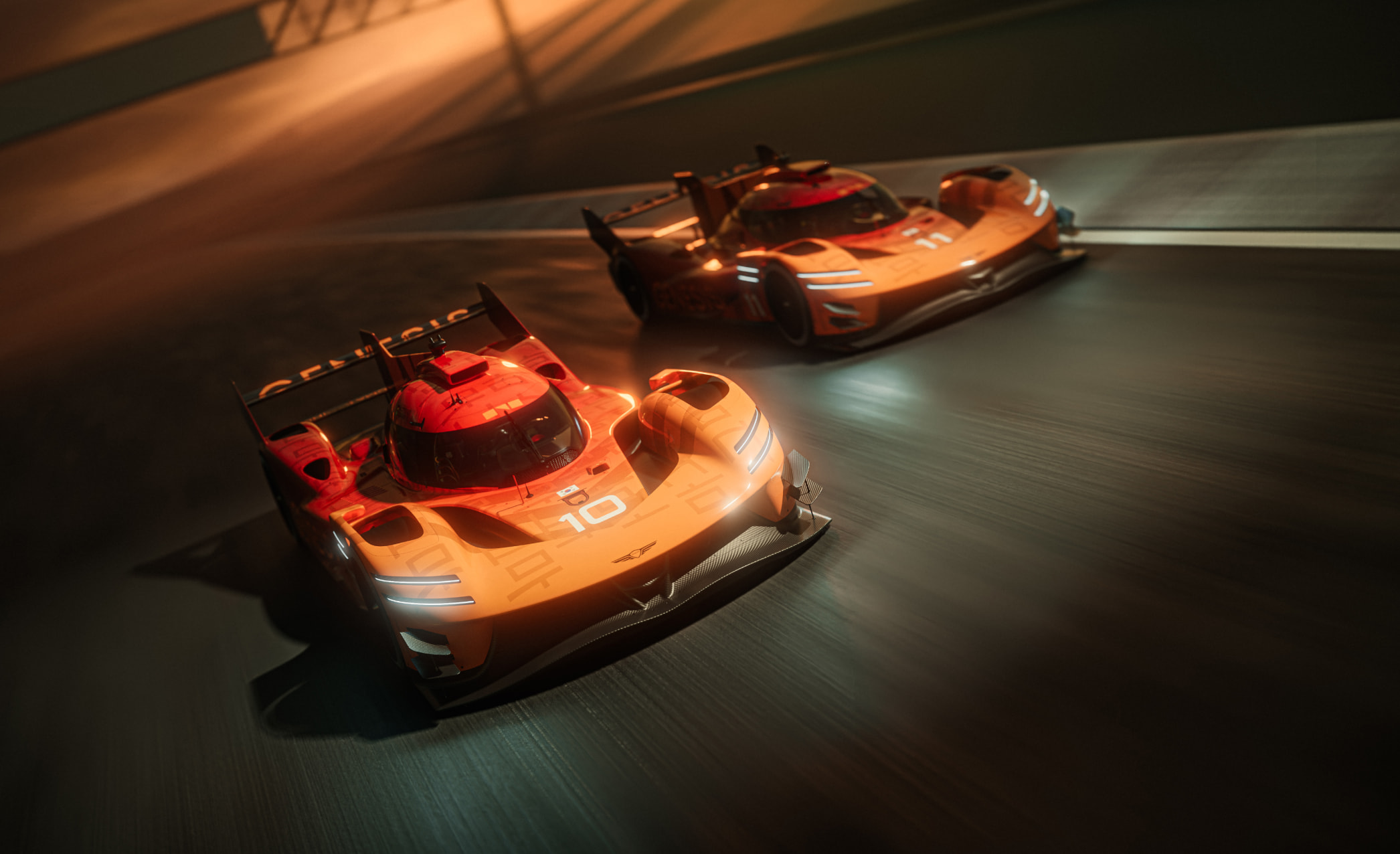 Two GMR-001 hypercars are racing on the racing track.