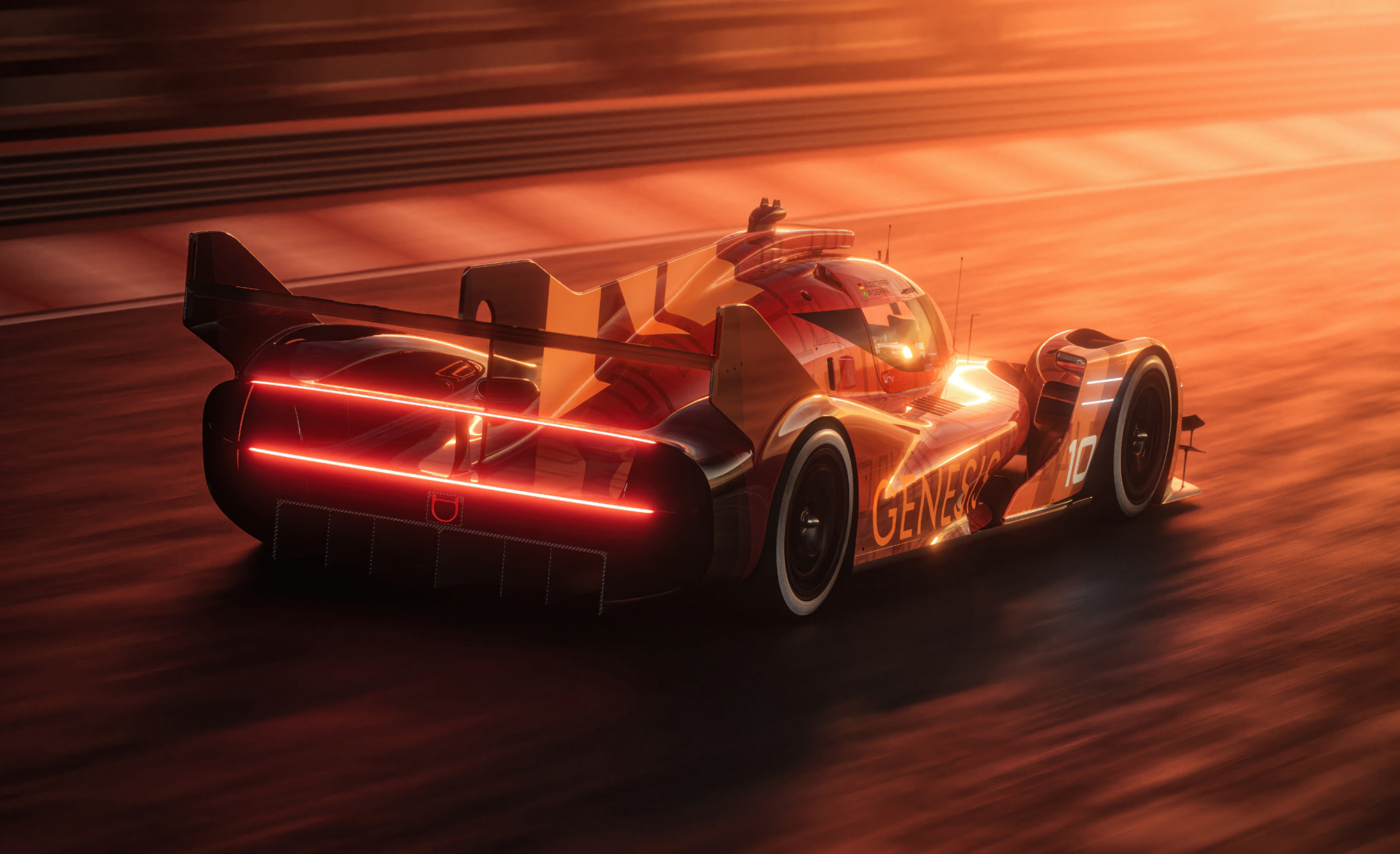 The rear of the GMR-001 hypercar is visible.