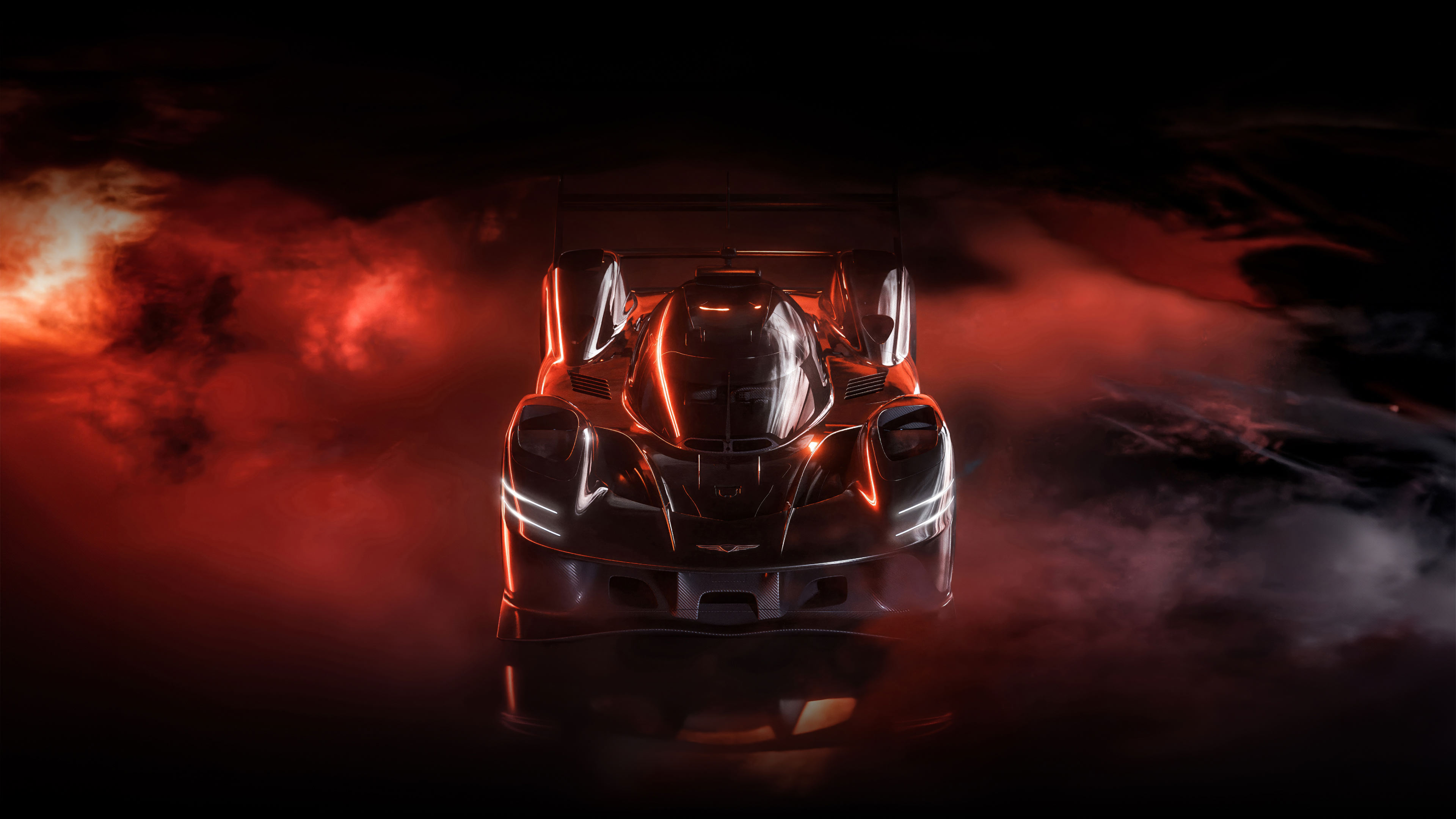 The black GMR-001 Hypercar can be seen in an almost birds-eye view, showcasing its curvatures. 