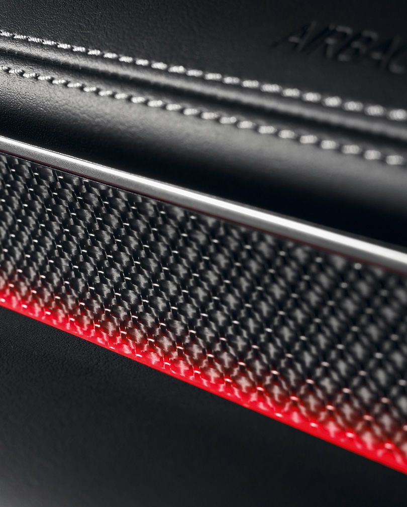 A close-up of the real carbon garnish inside G80 Sport.