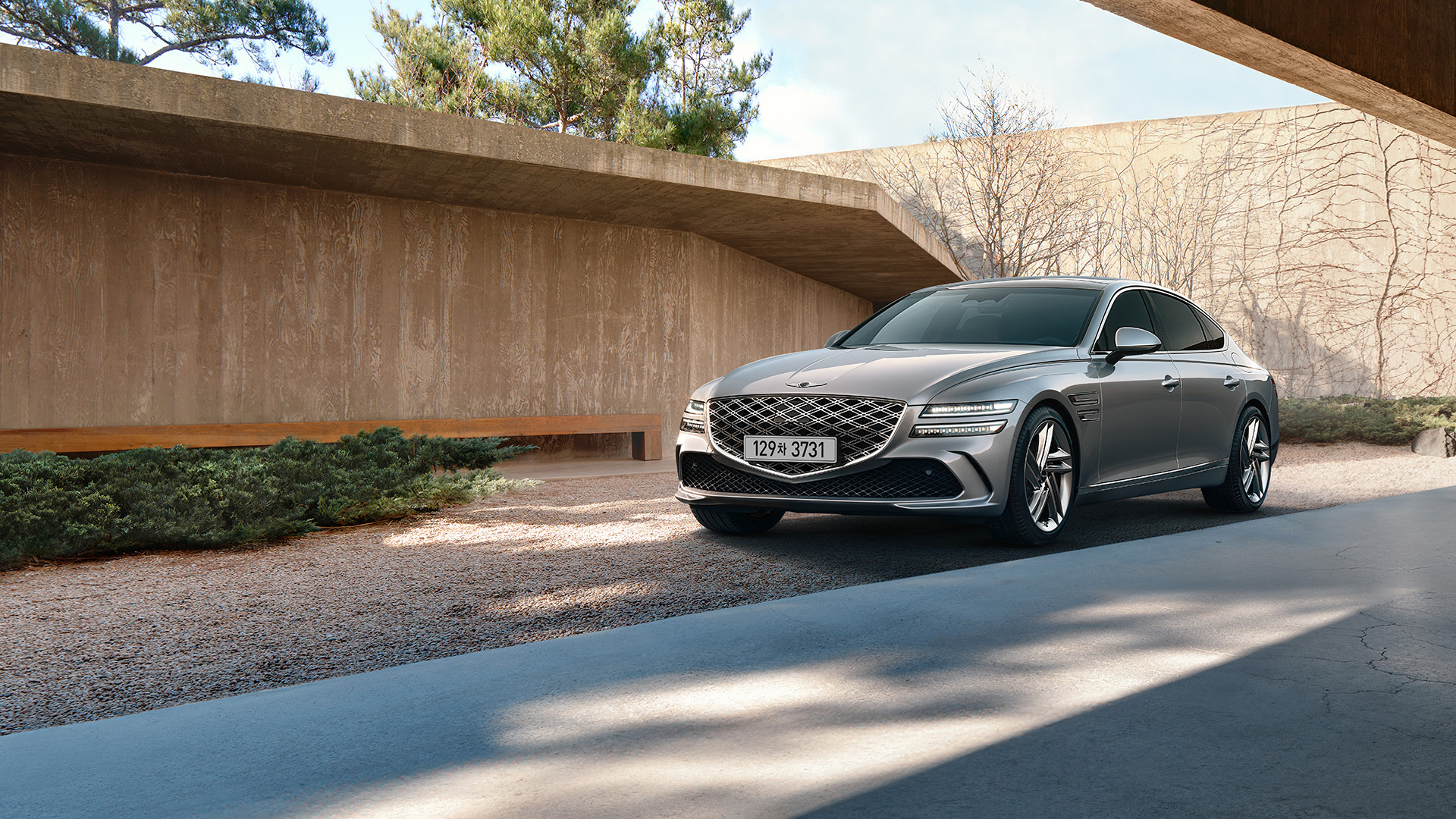 Two G80 vehicles, the Standard model and the Sport model