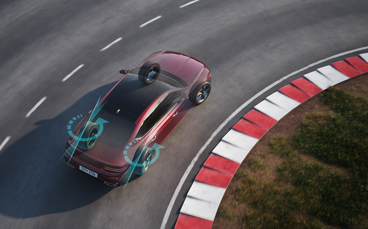 G80 driving on a curved road at a low speed.