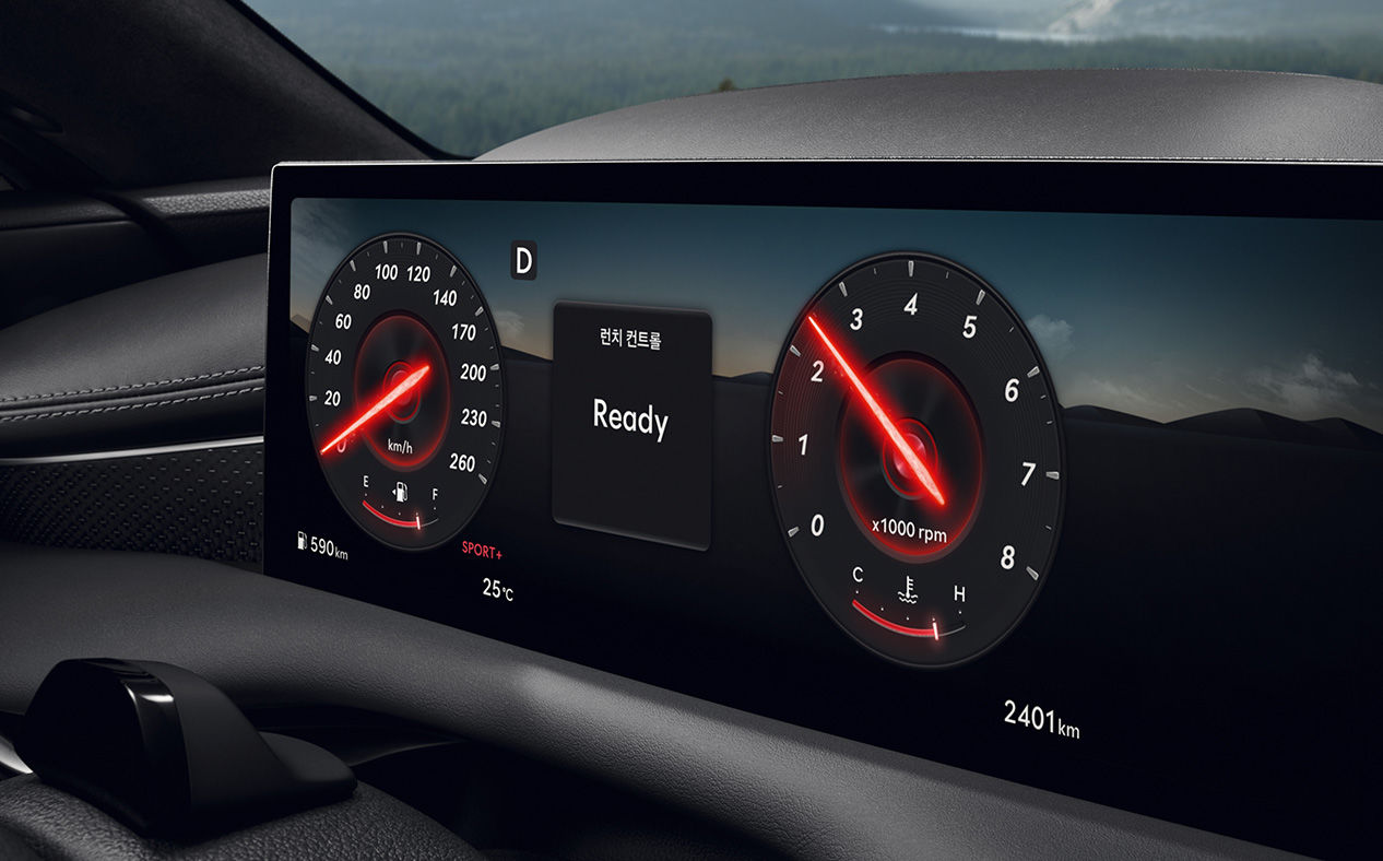 G80 Sport interior while it drives on a road.