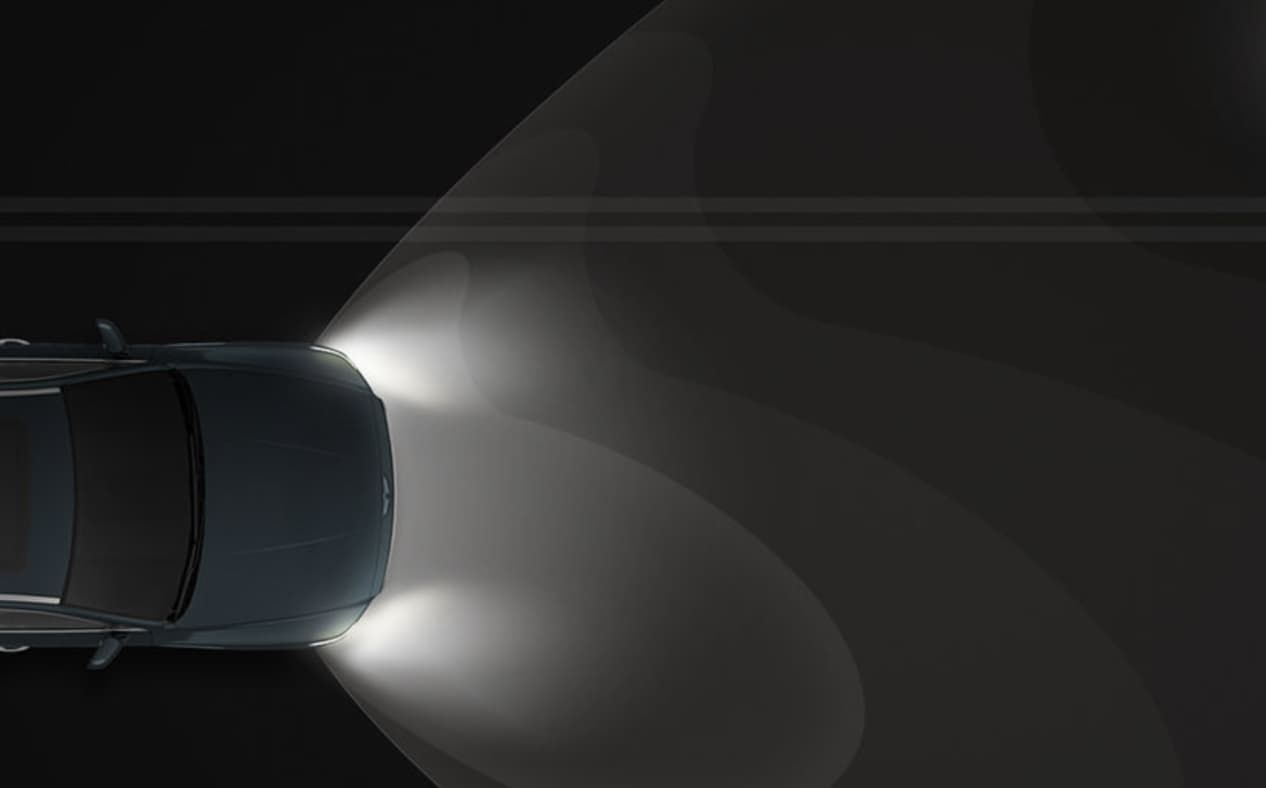 G80 drives at night with the head lamps on.