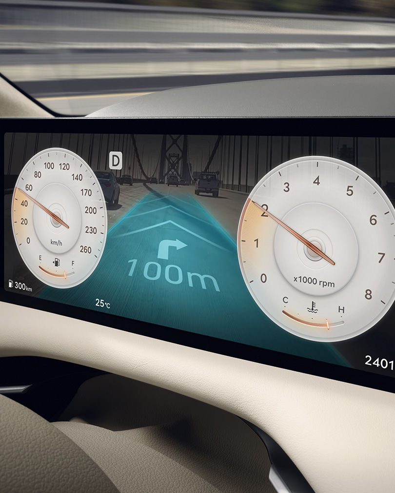 AR navigation provided on the 27-inch OLED display.