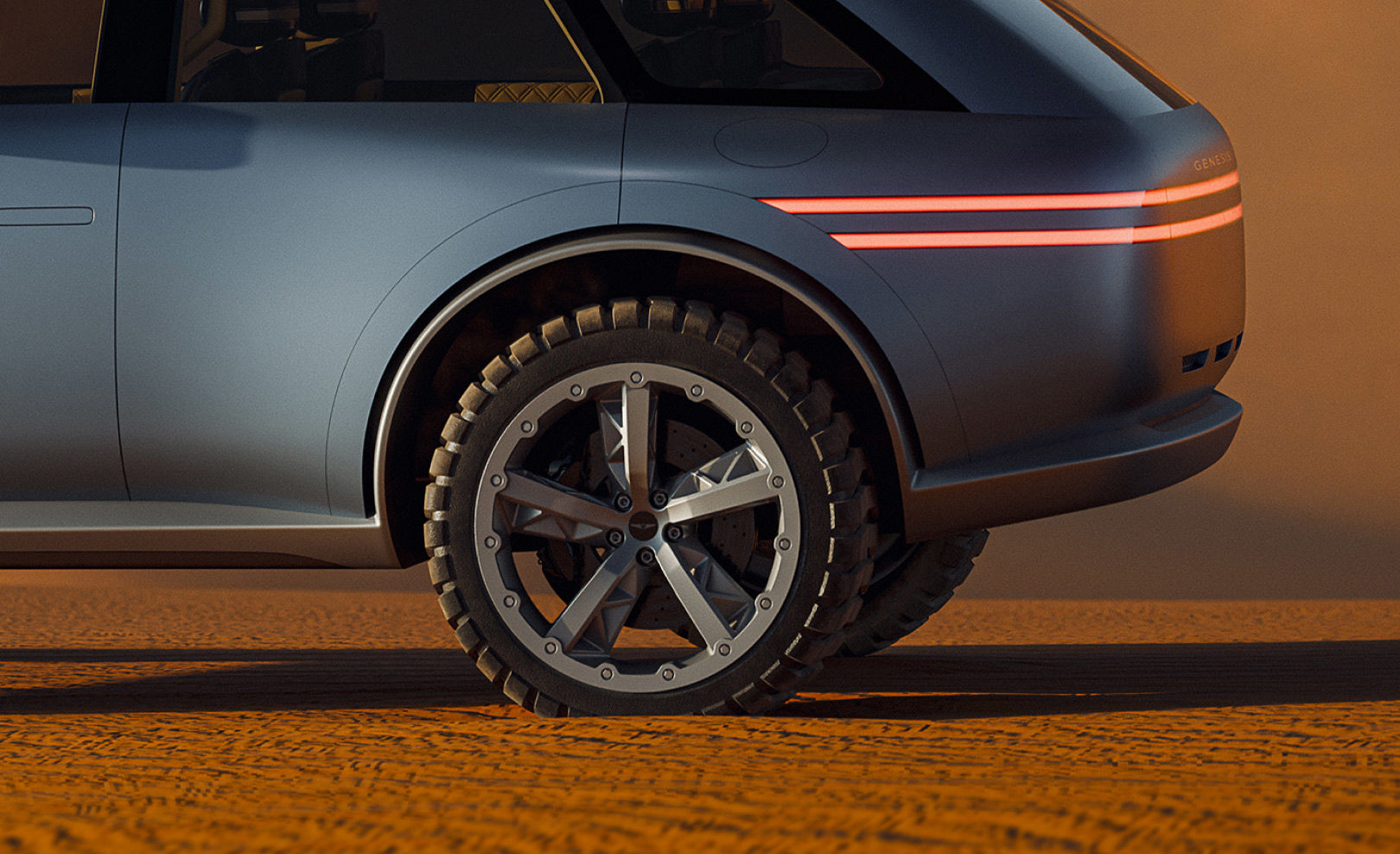 A zoomed-in view of the Genesis X Gran Equator concept’s 24-inch beadlock wheels is shown.