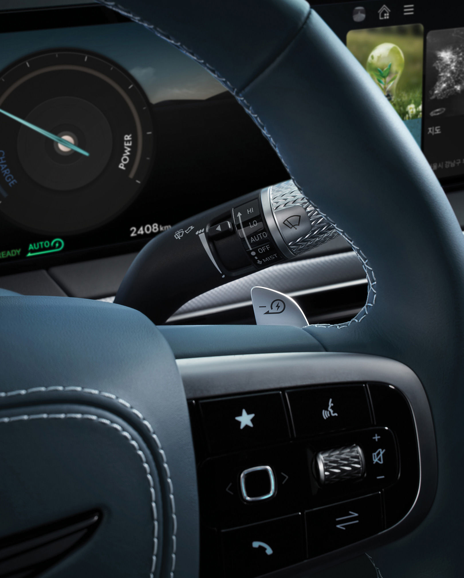 Some of the vehicle's steering wheels appear enlarged. You can see an operation button.