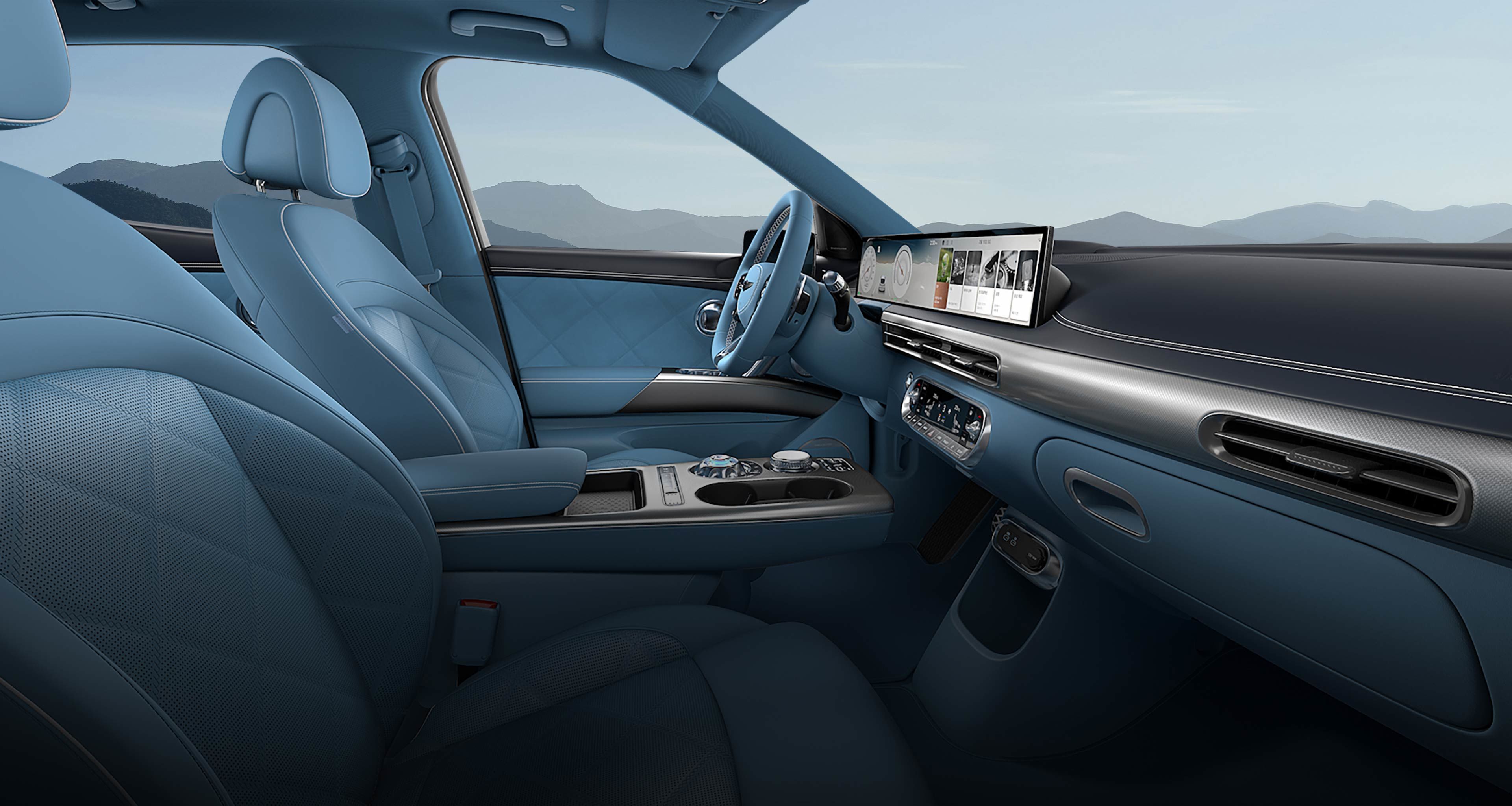 The interior of the GV60, featuring an Icy Prussian Blue/Sky Blue Two Tone color.
