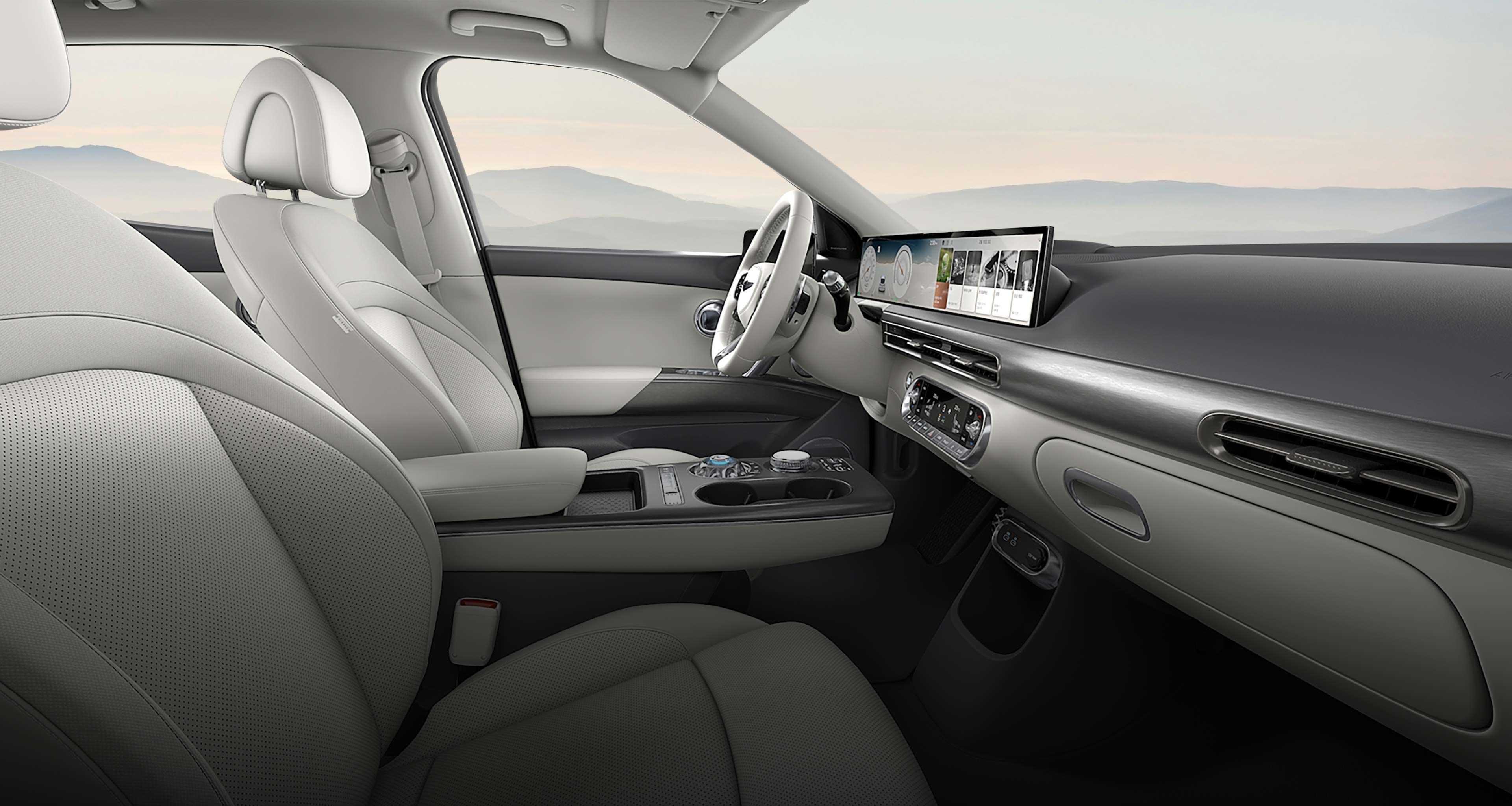 The interior of the GV60, featuring an Ash Gray/Glacier White Two Tone color.