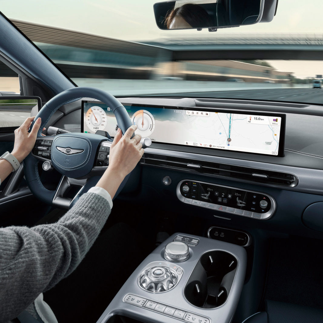 This is a view from behind of the driver following the navigation instructions.
