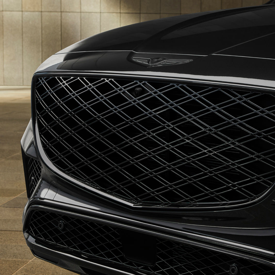 The front of the GV80 Black is displayed, featuring the radiator grille and the Genesis logo above it.