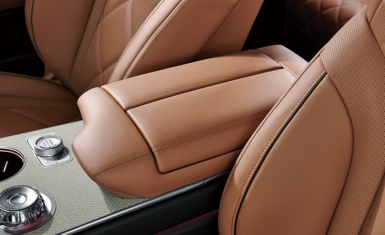 The front seat armrest.